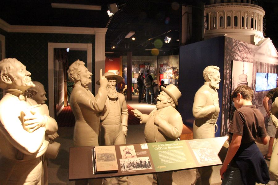 Ford's Theatre Museum with men figurines and a child reading the plaque