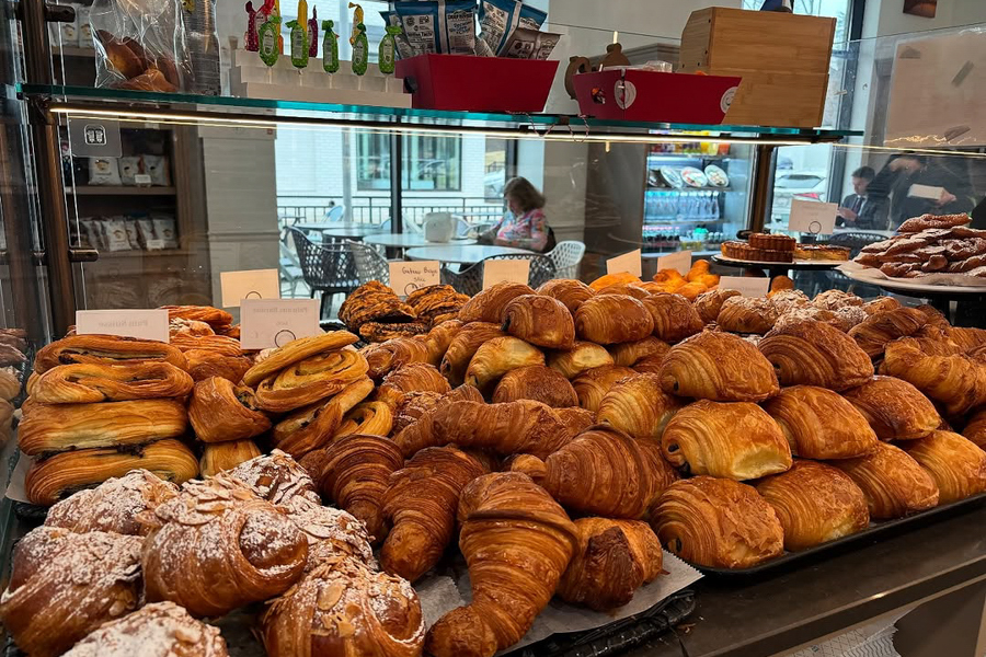 Golden croissants and flaky pastries fill the display case at Boulangerie Christophe in Washington, DC’s Georgetown neighborhood.