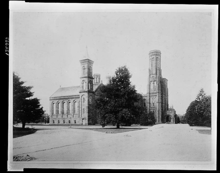 A view of the Smithsonian Institution building in a black-and-white-photograph.