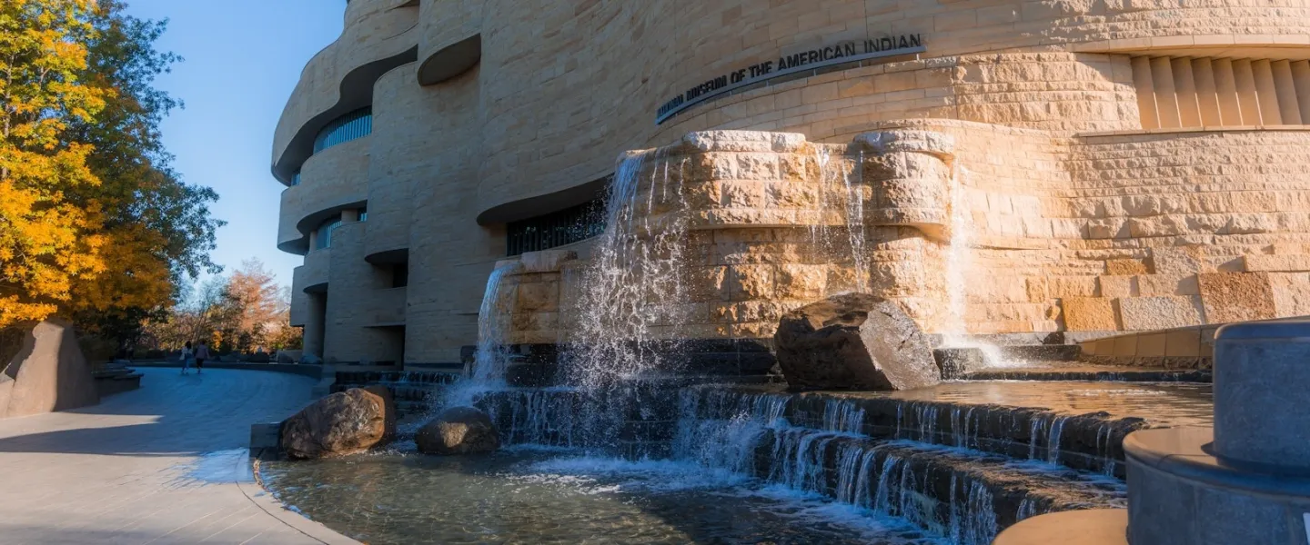 Water cascading over stone steps outside the National Museum of the American Indian.